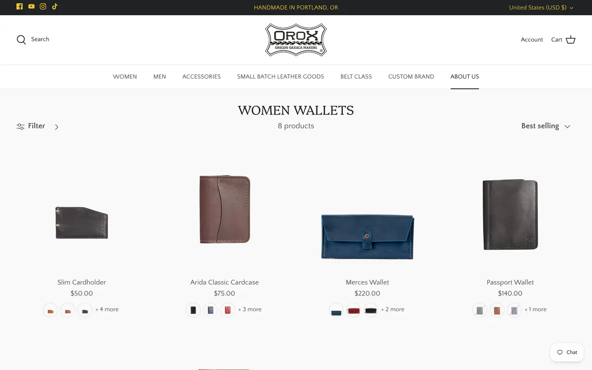 Four Orox wallets on the collection page, each showing a photograph, a name, a price and a row of colour swatches, with no star ratings anywhere on the cards.
